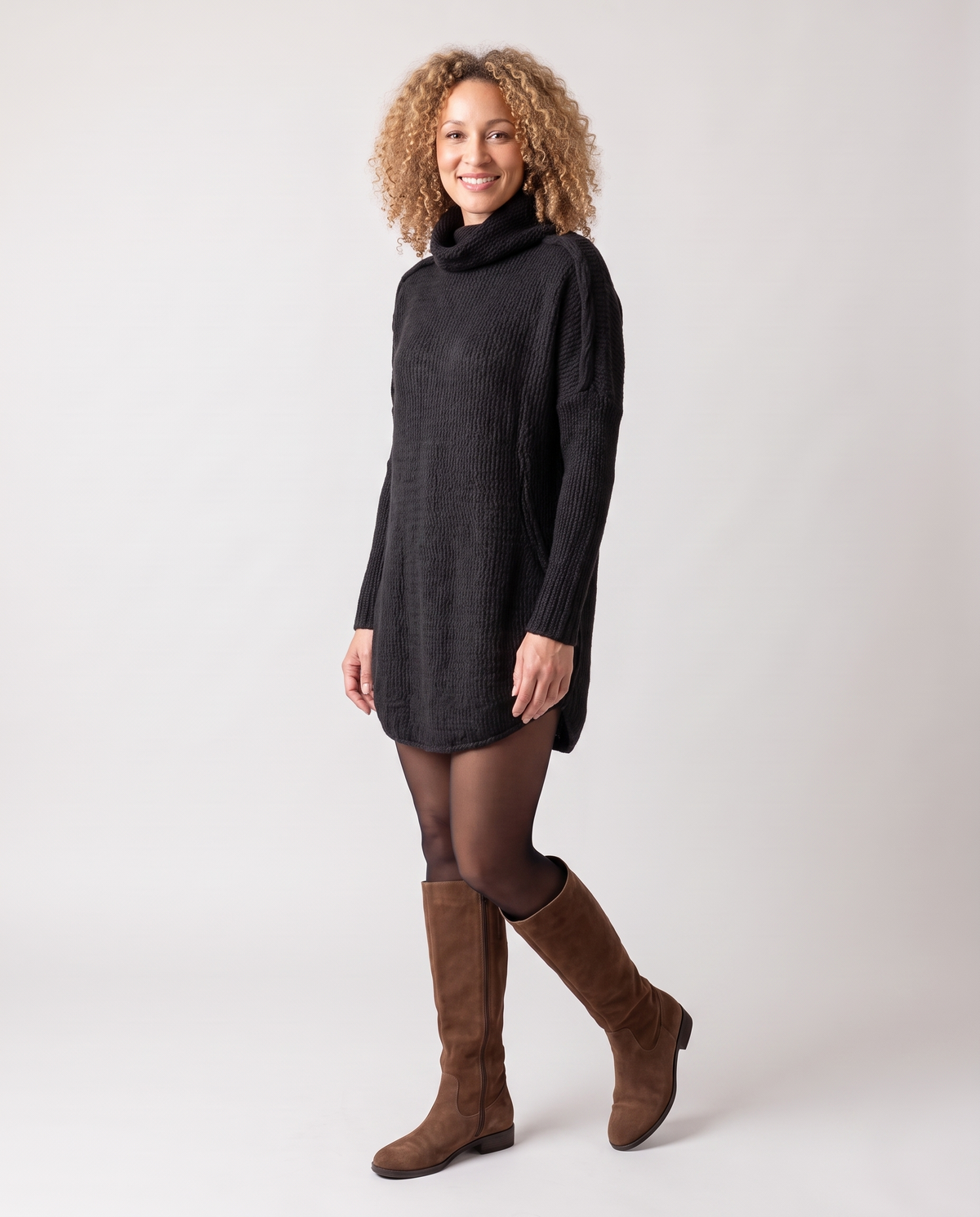 Chunky Funnel Neck Knitted Jumper Dress in Black, three quarter view