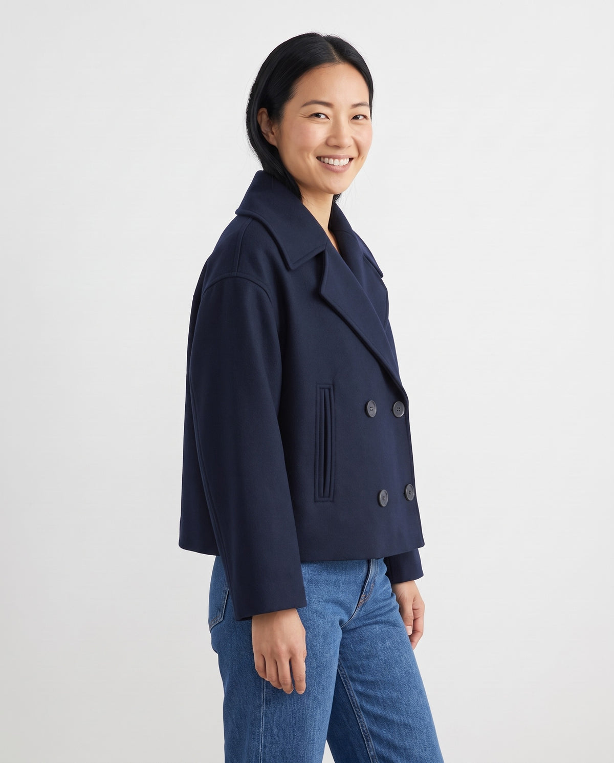 Tegan Women's Wool Double Breasted Peacoat in Dark Blue, three quarter view